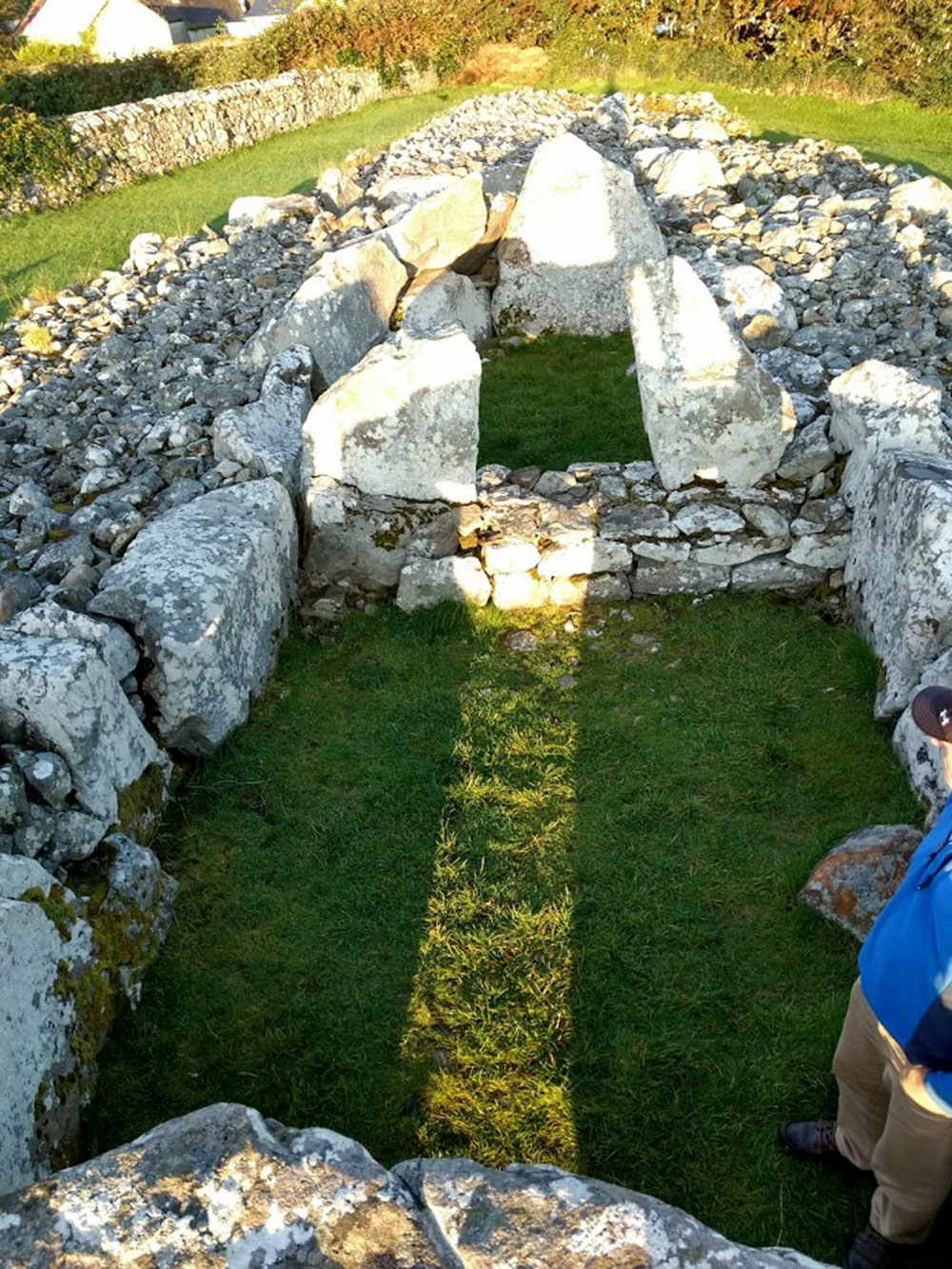 A beam of sunlight flashed into the chamber of Creevykeel, Autumn equinox, 2019.  Photograph © Eamon Murphy.