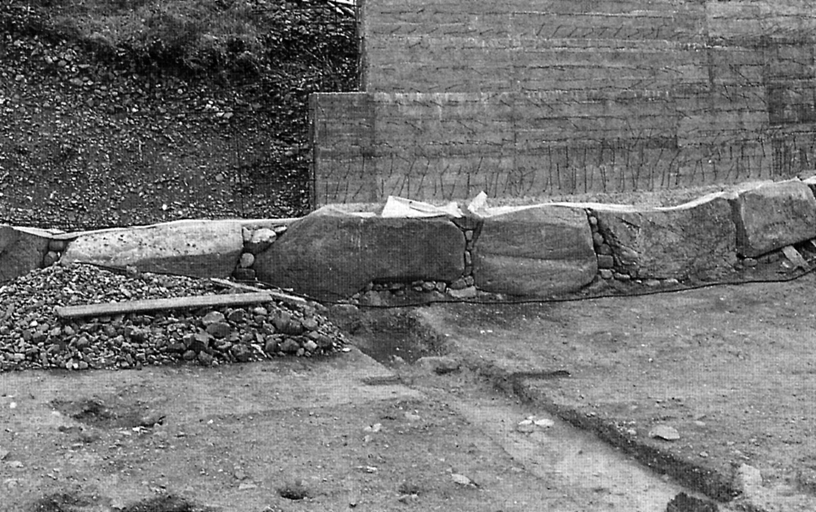 The concrete wall at Newgrange.