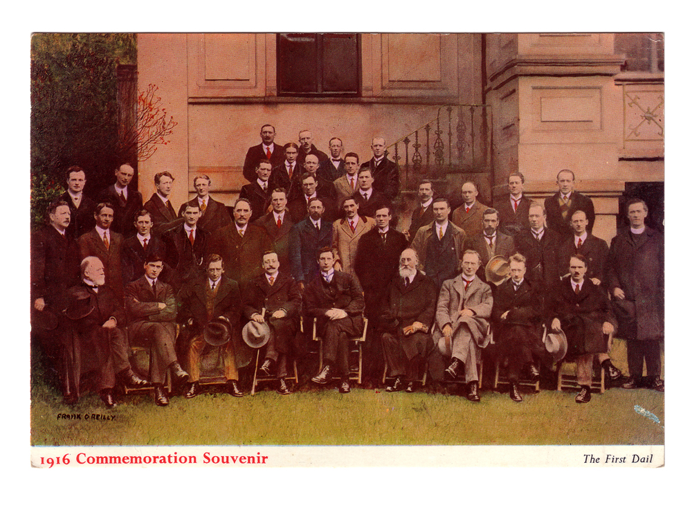 A postcard of the First Dáil, April 1919, with the chaplain Fr. Michael O'Flanagan standing to the right.