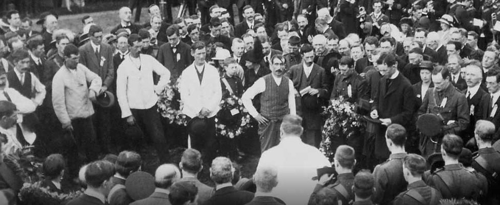 Fr. Michael O'Flanagan and Padraig Pearse at the grave of veteran Fenian, O'Dovovan Rossa, at Glasnevin cemetery, August 1915.