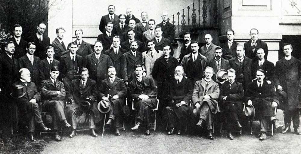 A meeting of the First Dail, 10 April, 1919, with Fr Michael standing at the right.