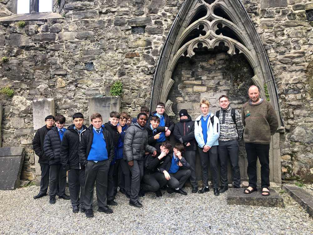 A group of students from Summerhill on a school tour of Sligo Abbey.