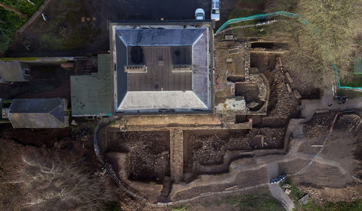 An aerial view of the excavation of the large passage-tomb under Dowth Hall.