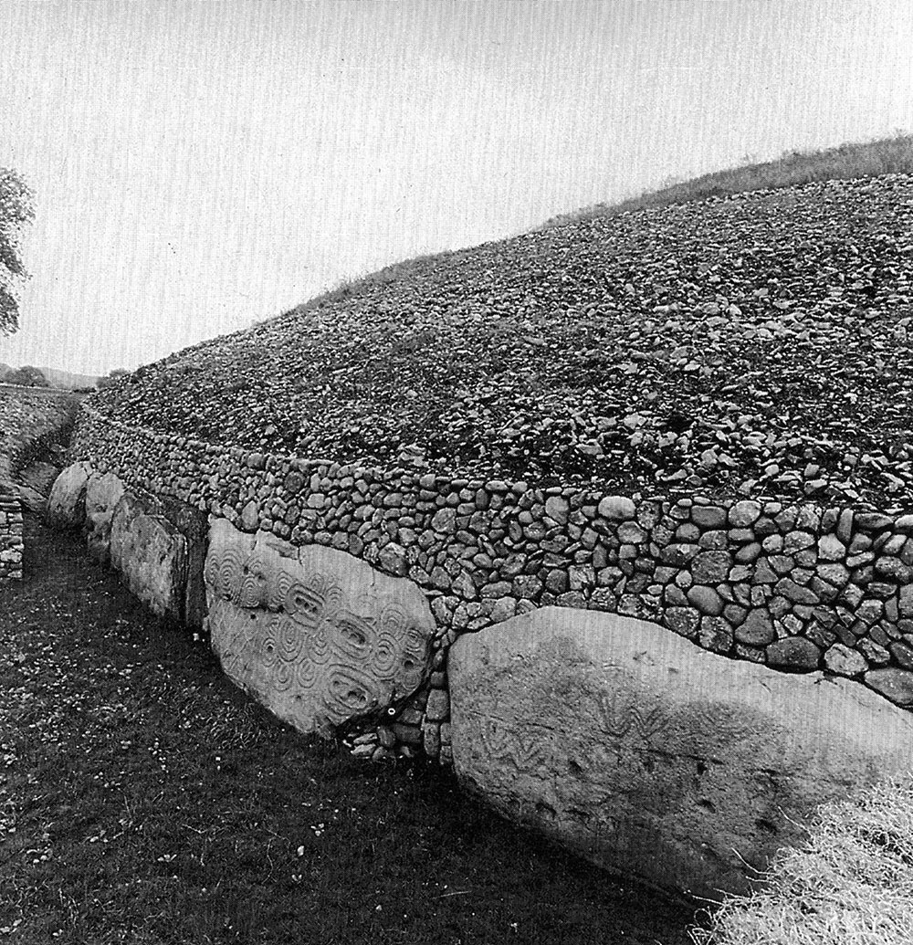 The kerbstones on the north-west side of Newgrange after Michael O'Kelly's excavation and restoration.