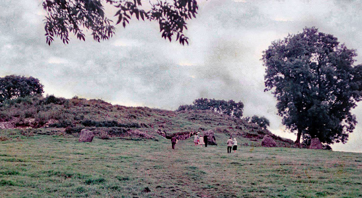 Visitors to Newgrange in a pre-restoration photograph of the monument taken in the 1950's.