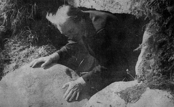 The Taoiseach, Mr Haughey, leaving one of the tombs at Knowth