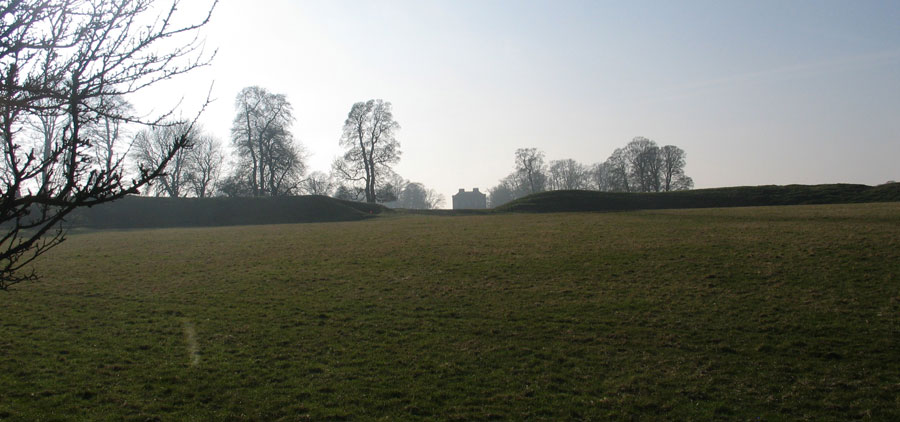 Looking south west through the great enclosure  to Dowth Hall beyond.
