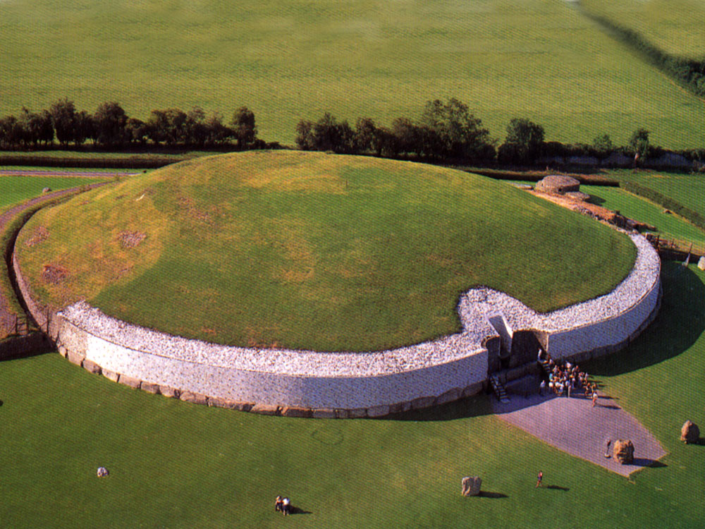 Newgrange from the air in an old Bord Failte postcard.