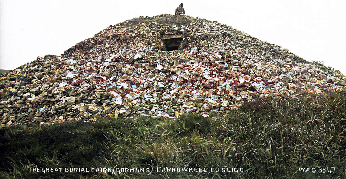 R. A. S. Macalister sitting on Gorman's cairn.