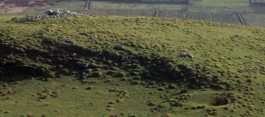 The passage-grave and the Thief's Hole at Carnanweelan.