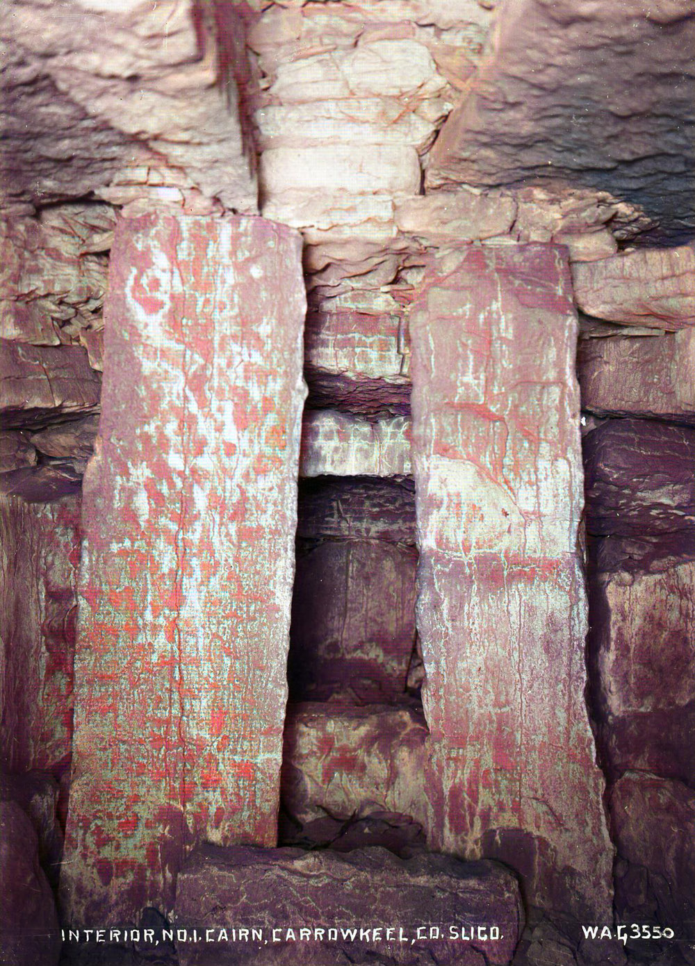 Within the chamber of Cairn G, looking to the end recess.