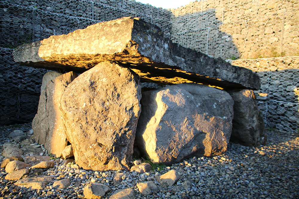 The chamber of Listoghil at Carrowmore illuminated by sunlight at Samhain.