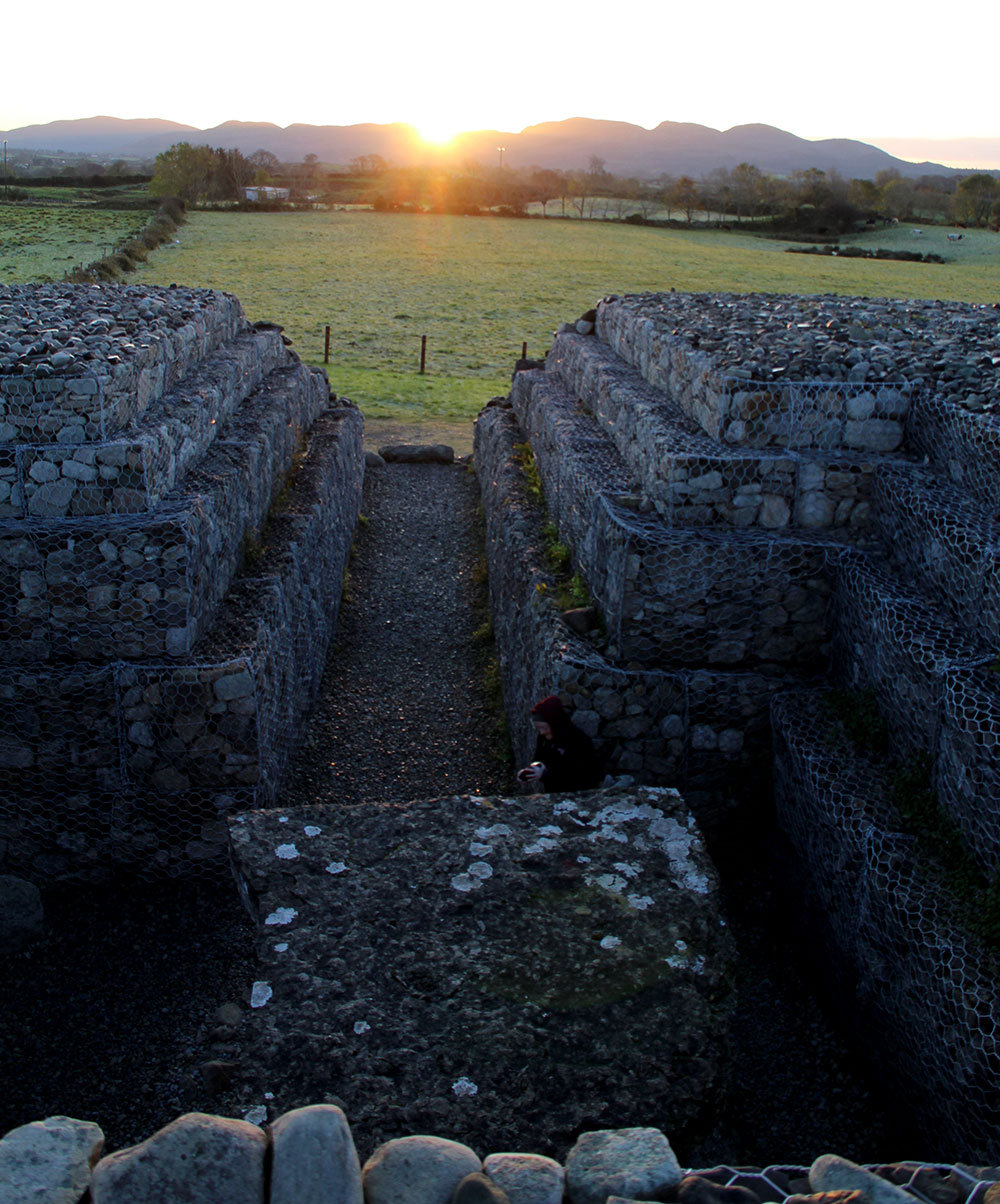 Sunrise at Samhain within the chamber of Listoghil, the focal monument at Carrowmore.
