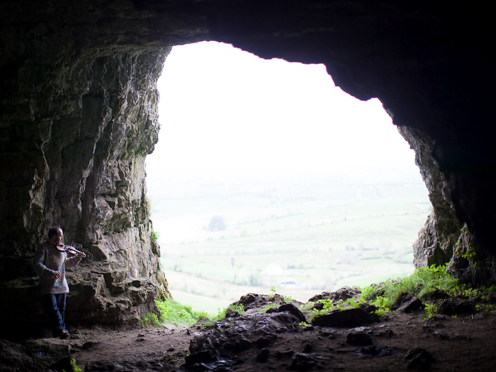 Fiddler in the cave.