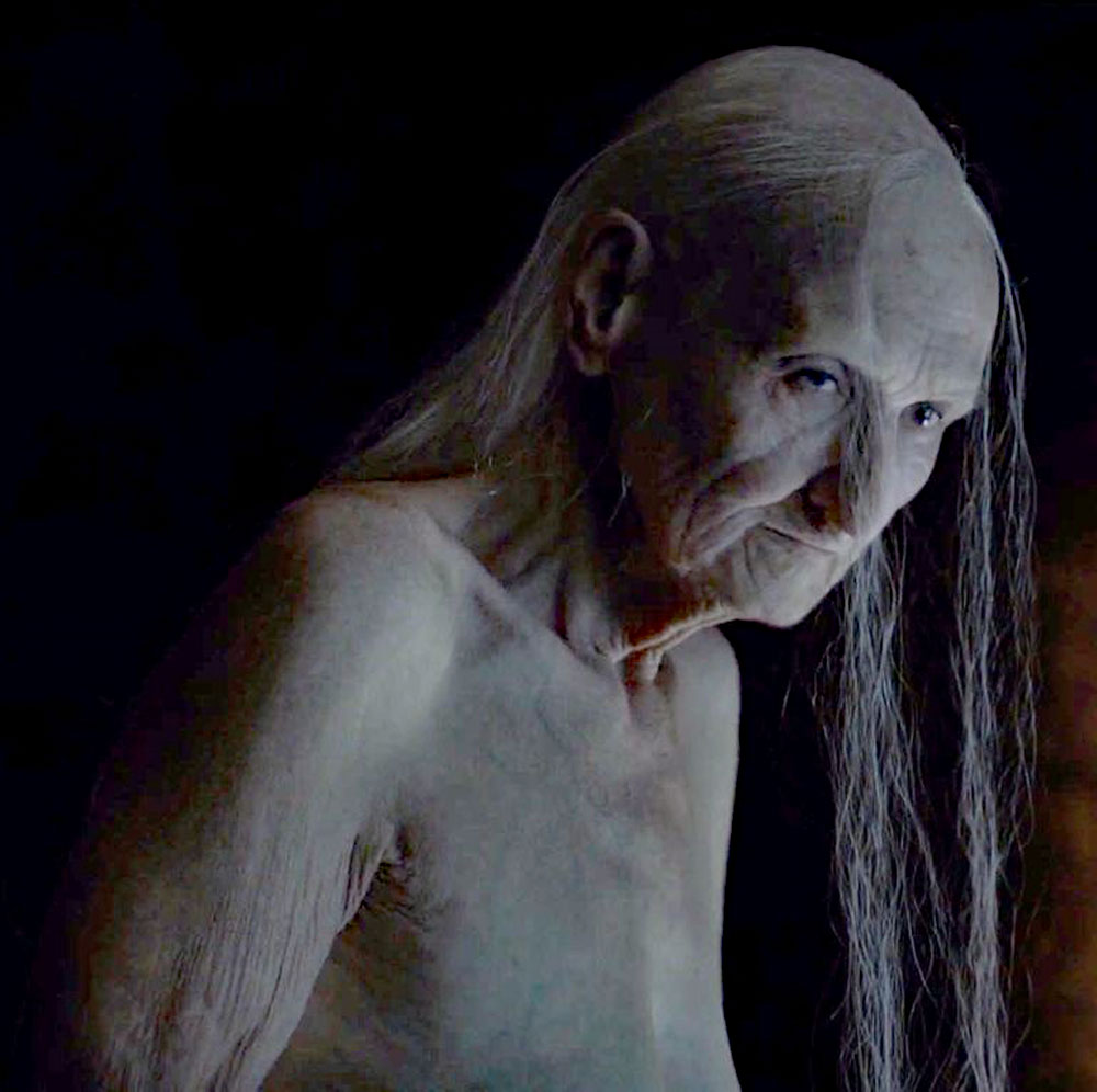 The Old Red Woman, played by Carice van Houten, who appears in A Game of Thrones.