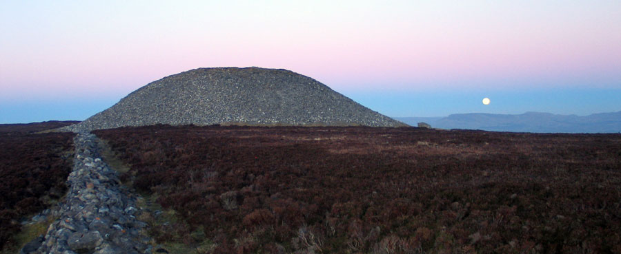 Full moon rising, viewed from Queen Maeve's cairn on Knocknarea in County Sligo.