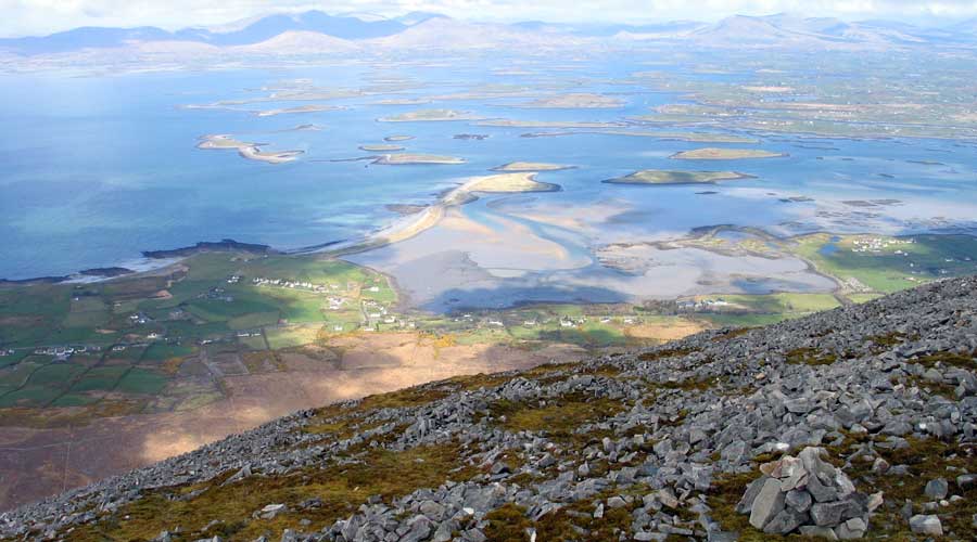 The
            dramatic view across Clew Bay from the top of the Reek