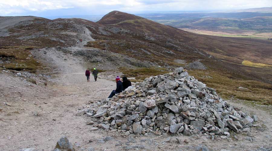 The 
  view to Boheh (nearest hill, top right) from the cairn on the 'saddle' of Croagh 
  Patrick.