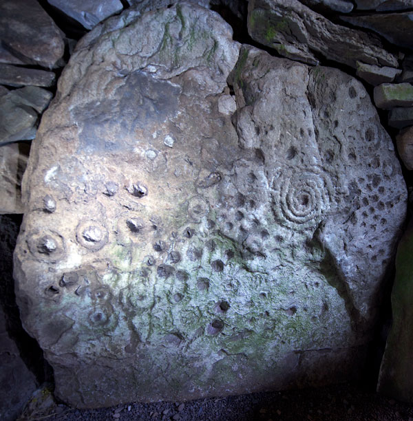 An engraved stone within the passage of Cairn T.