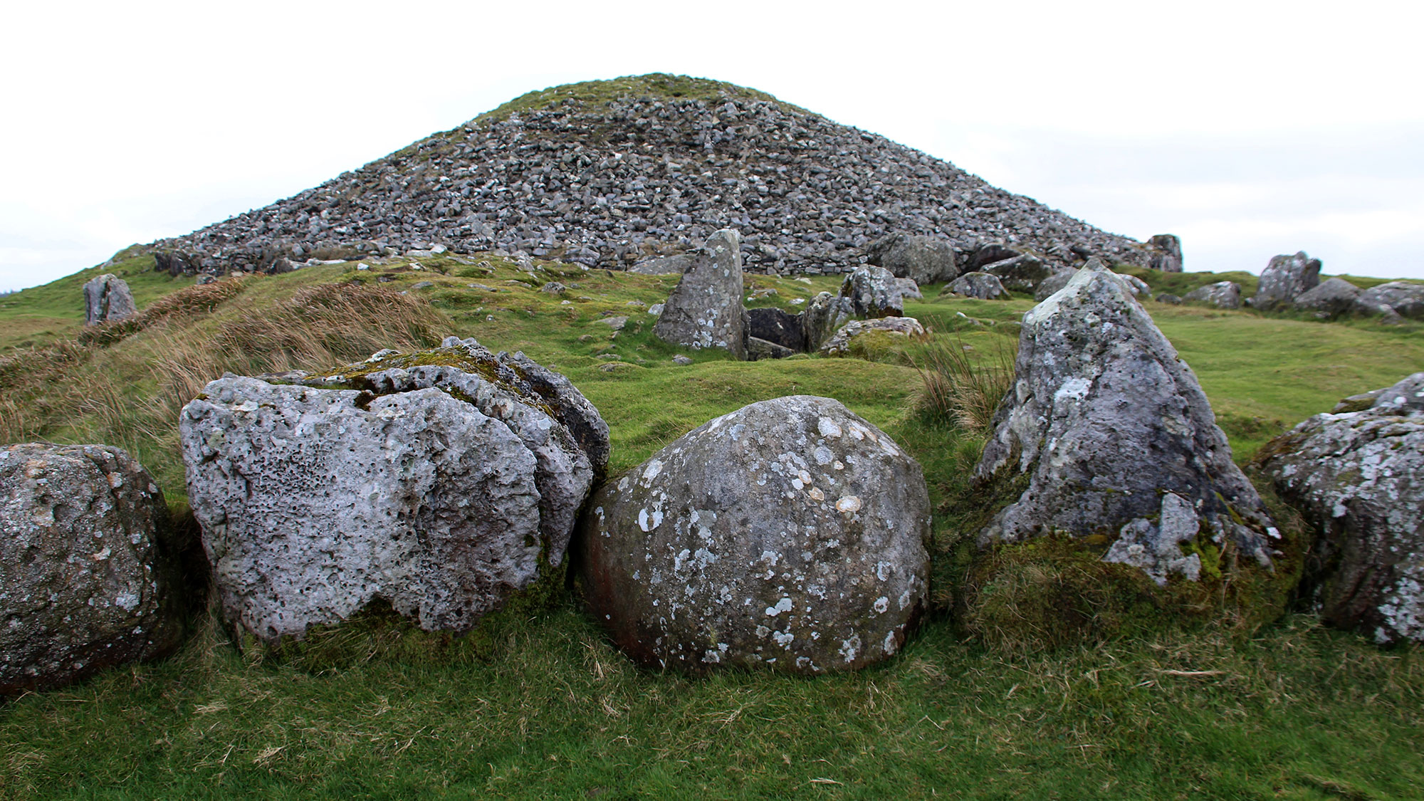 Looking into the chamber of Monument S with Cairn T beyond.