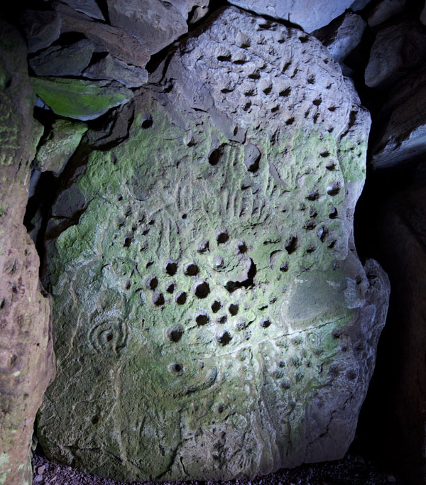 Decorated passage stone within Cairn T.