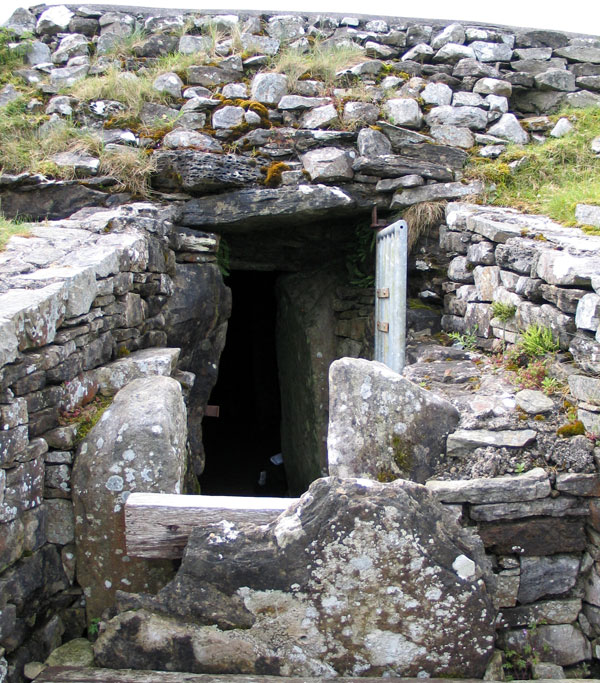 The entrance of Cairn L, with its tall sillstone.