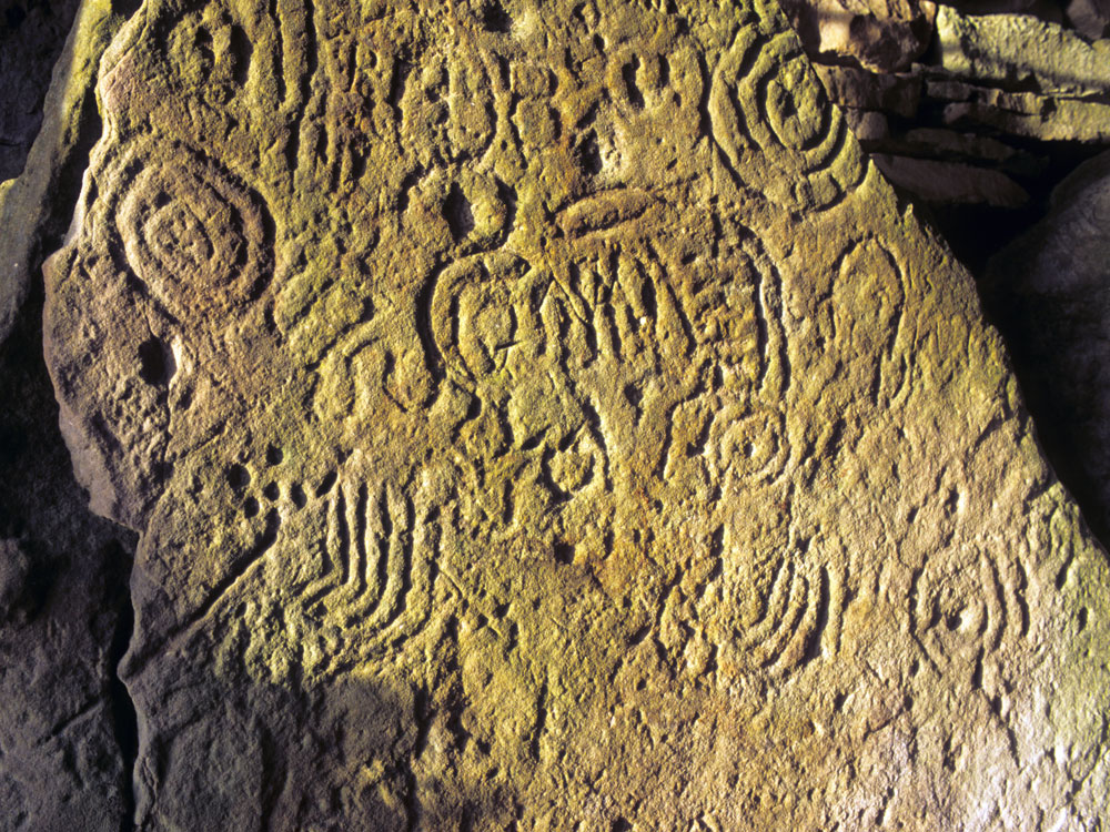 Engraved  stone in Cairn T