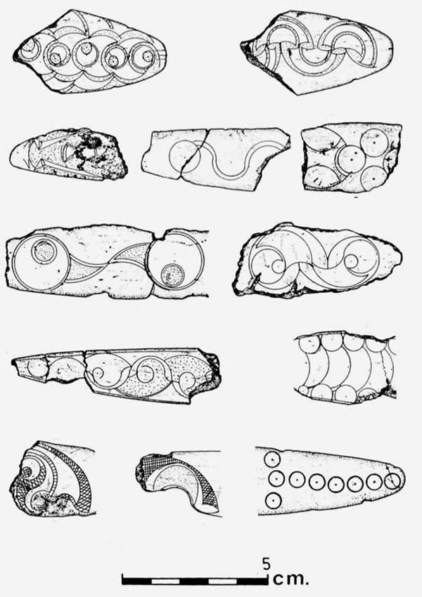 Carved slips of cattle-bone from Cairn H.