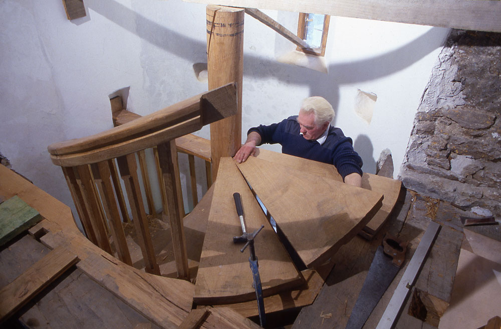 Master carpenter Dinny Harran building the oak spiral staircase in Parke's Castle.