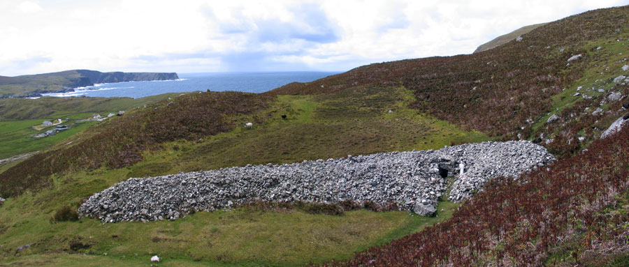 The long and unusual cairn at Columba's well in Glencolumbkille.