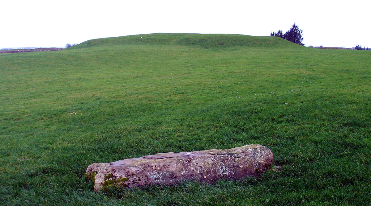 Queen Maeve's Palace and the fallen pillar-stone.